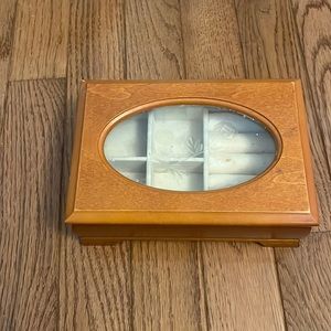 a wooden jewelry box
